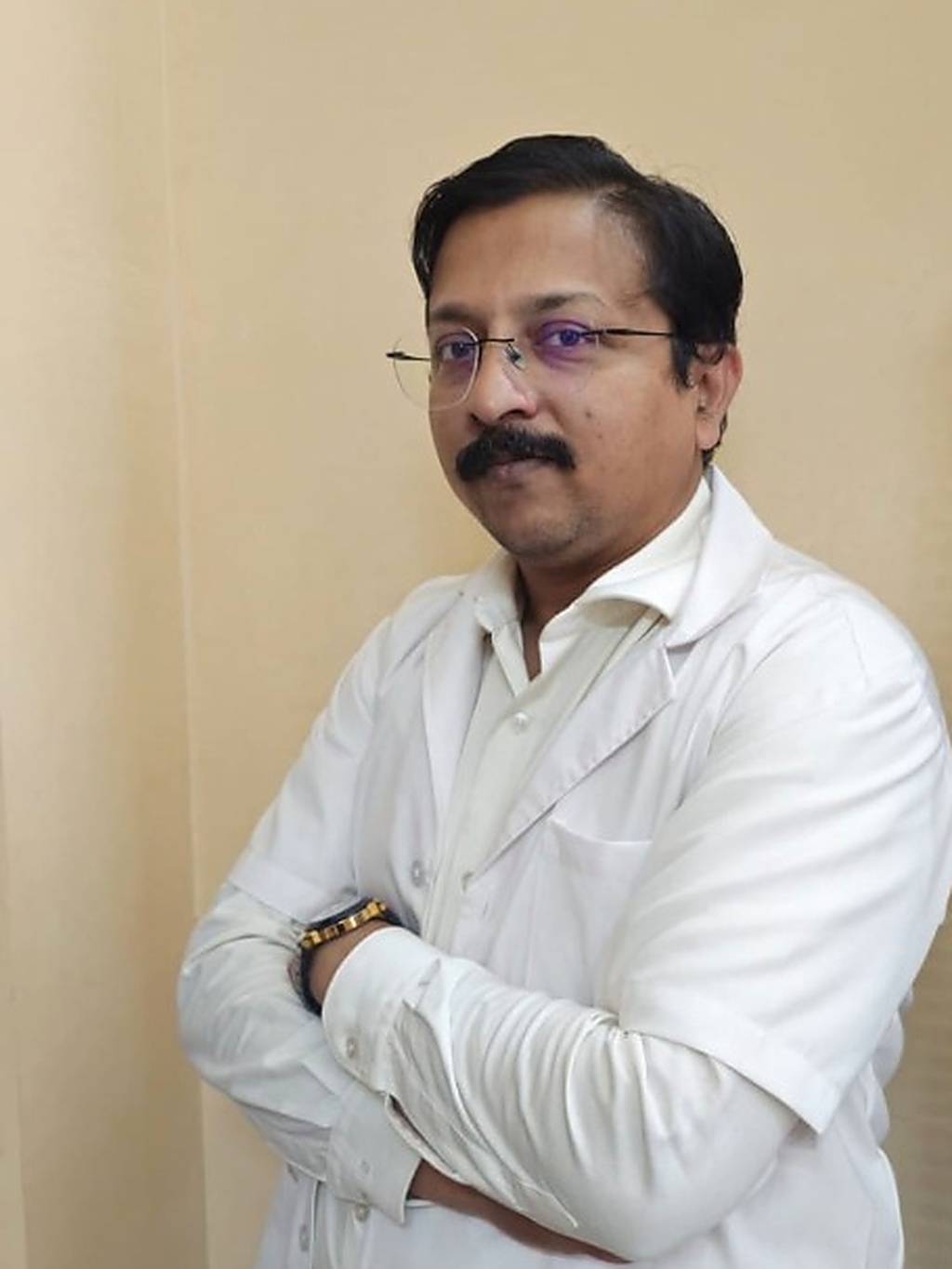 Prof. Dr. Sandeep Kumar Panigrahi in clinical coat